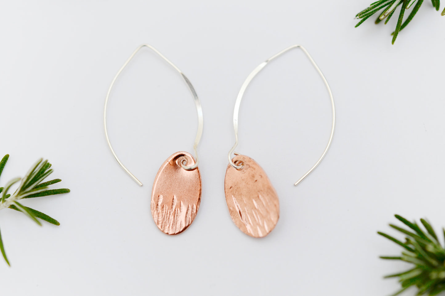 Oval Beaten Copper earrings 16mm length on marquis hook