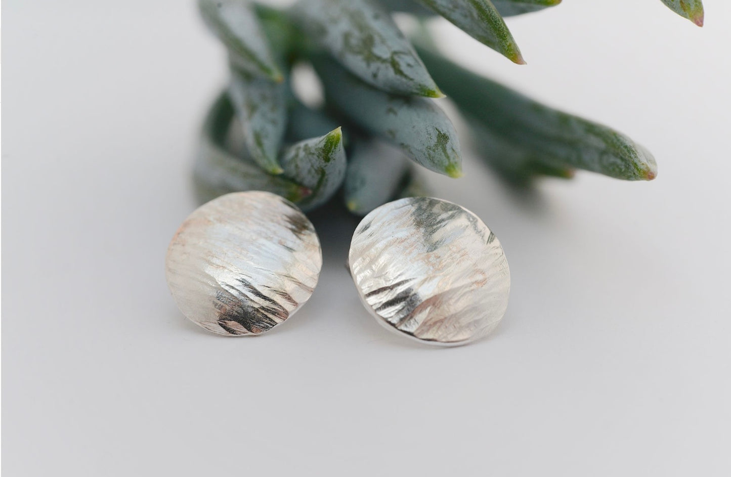 Tide stud earrings