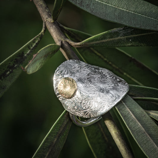 Silver Shield Ring with Dandelion detail and brass feature